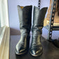 Justin’s black Bull Hyde pointed toe cowboy boot