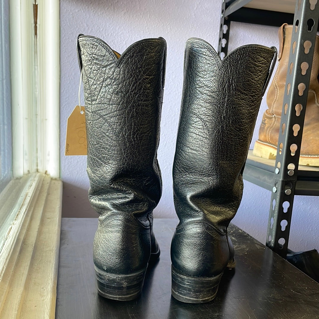 Justin’s black Bull Hyde pointed toe cowboy boot